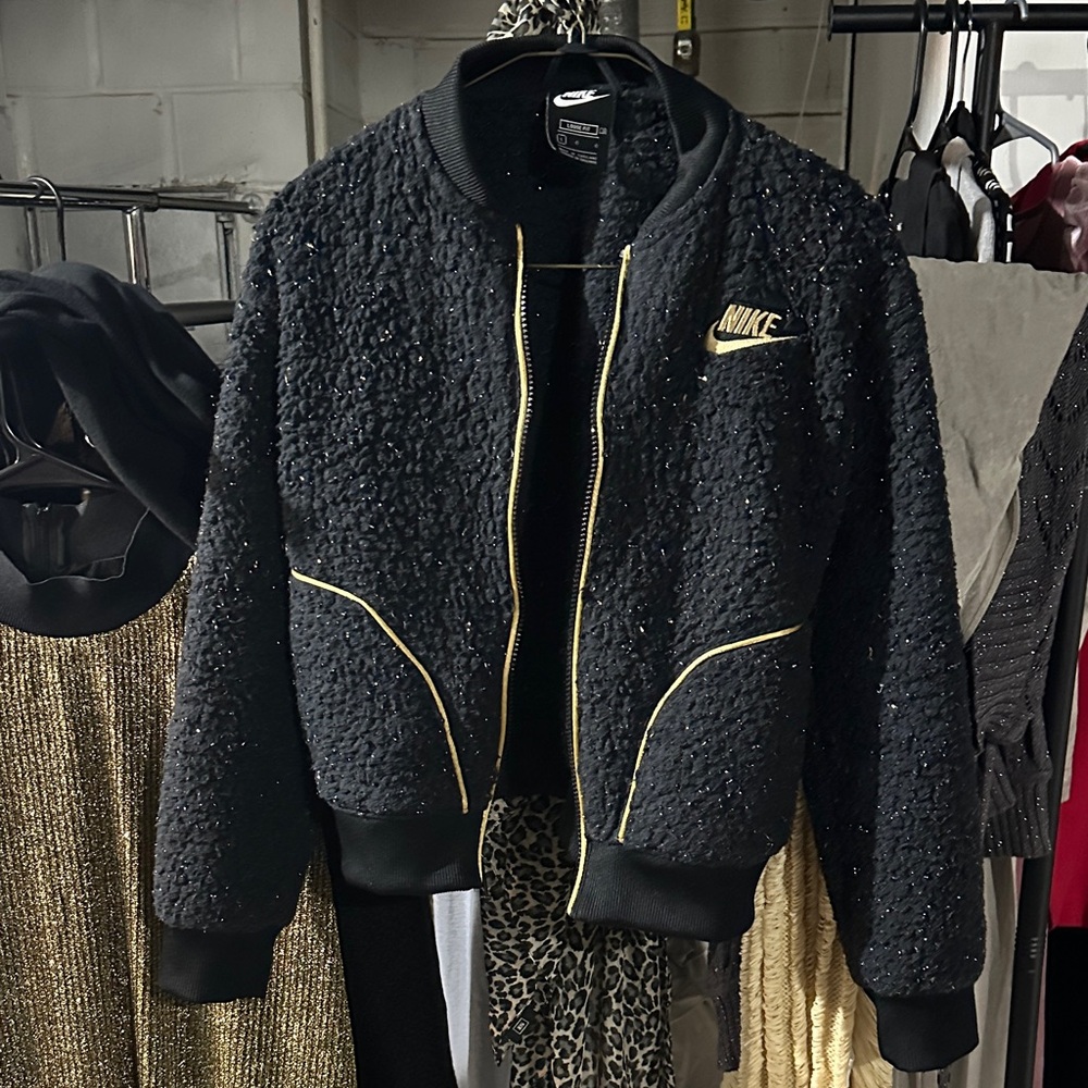 Nike Black Jacket with Gold Detailing